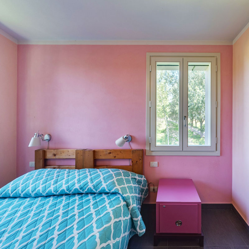 pink room of Locanda Bortolino Hostel