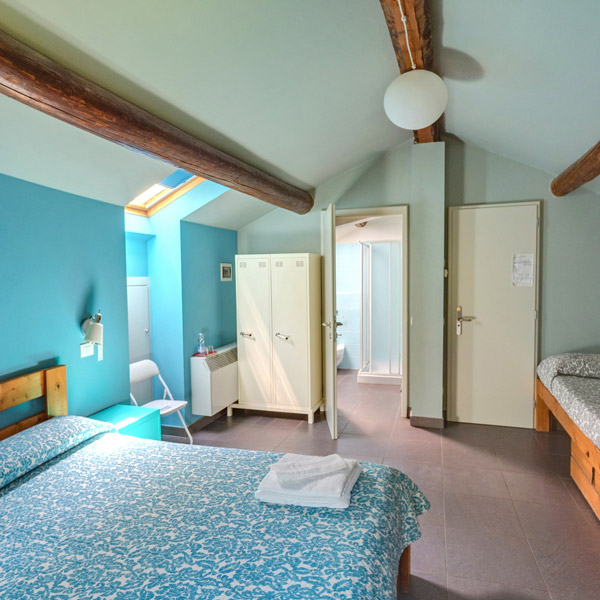 blue room of Locanda Bortolino Hostel